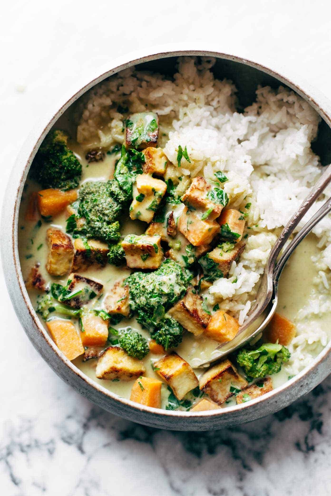 5-Ingredient Green Curry! packed with tons of veggies, an easy green curry sauce, and finished with golden raisins and cilantro. Easy! | pinchofyum.com