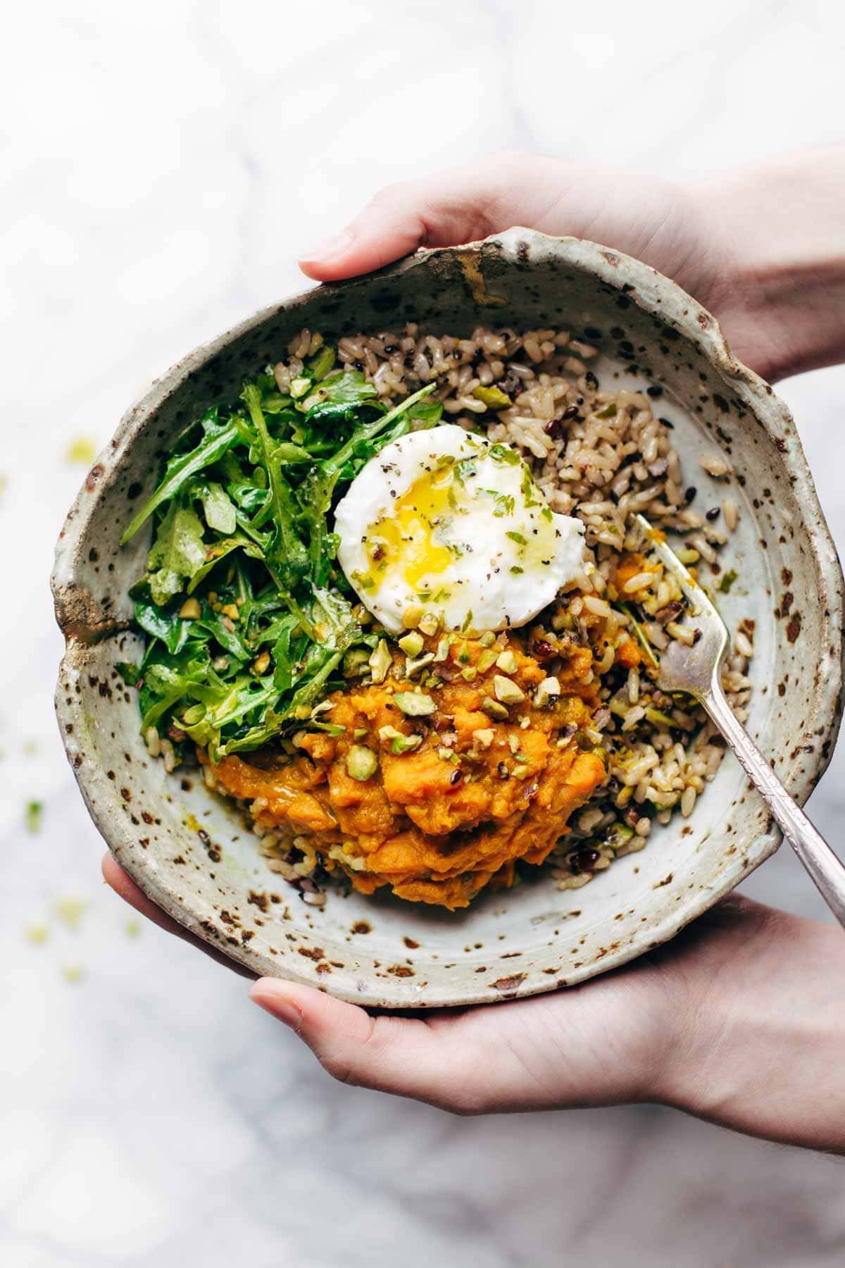 Healing Bowls with Turmeric Sweet Potatoes, Poached Eggs, and Lemon Dressing