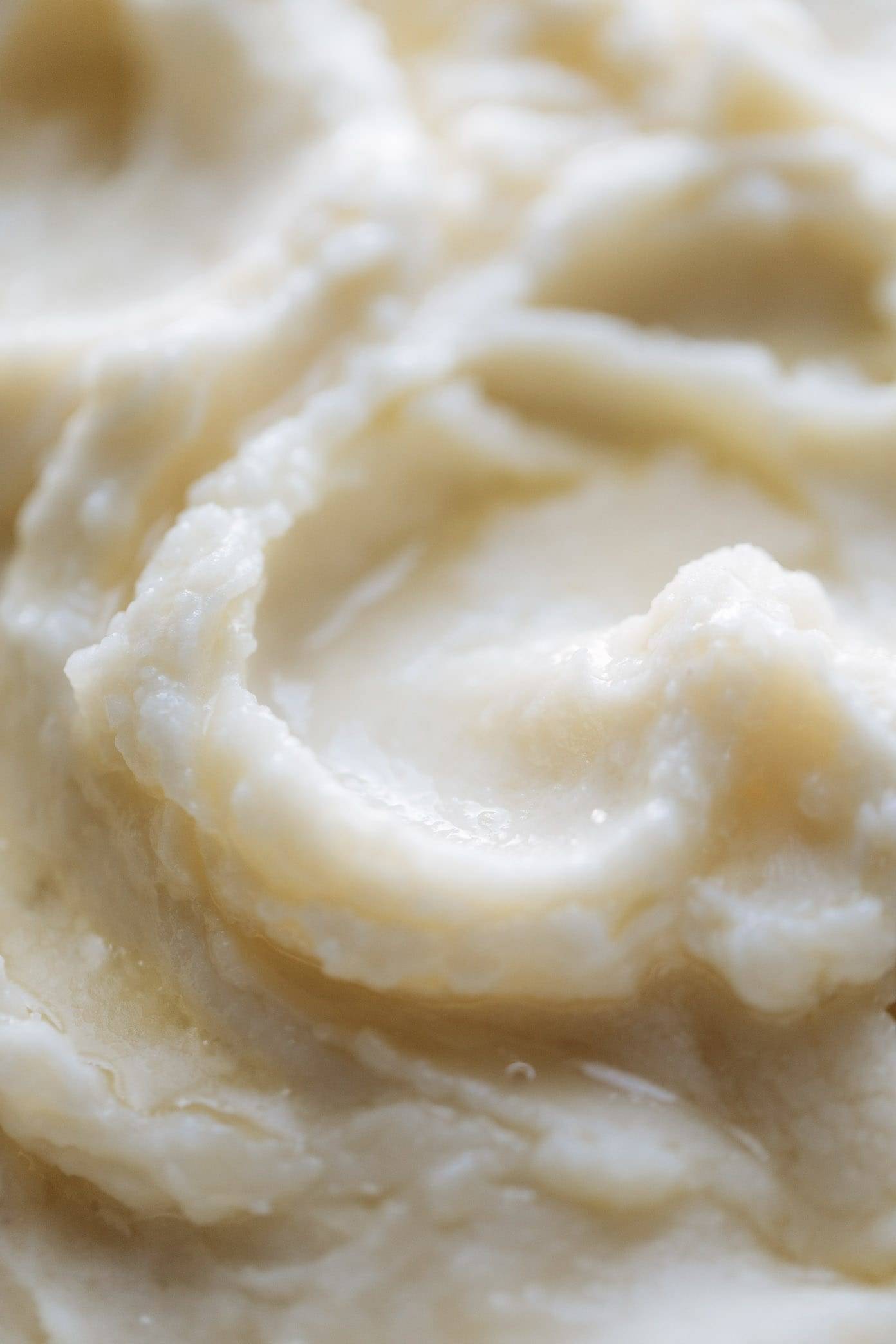 THE BEST Mashed Potatoes! So creamy, so fluffy, and SO GOOD. Made in the Instant Pot!