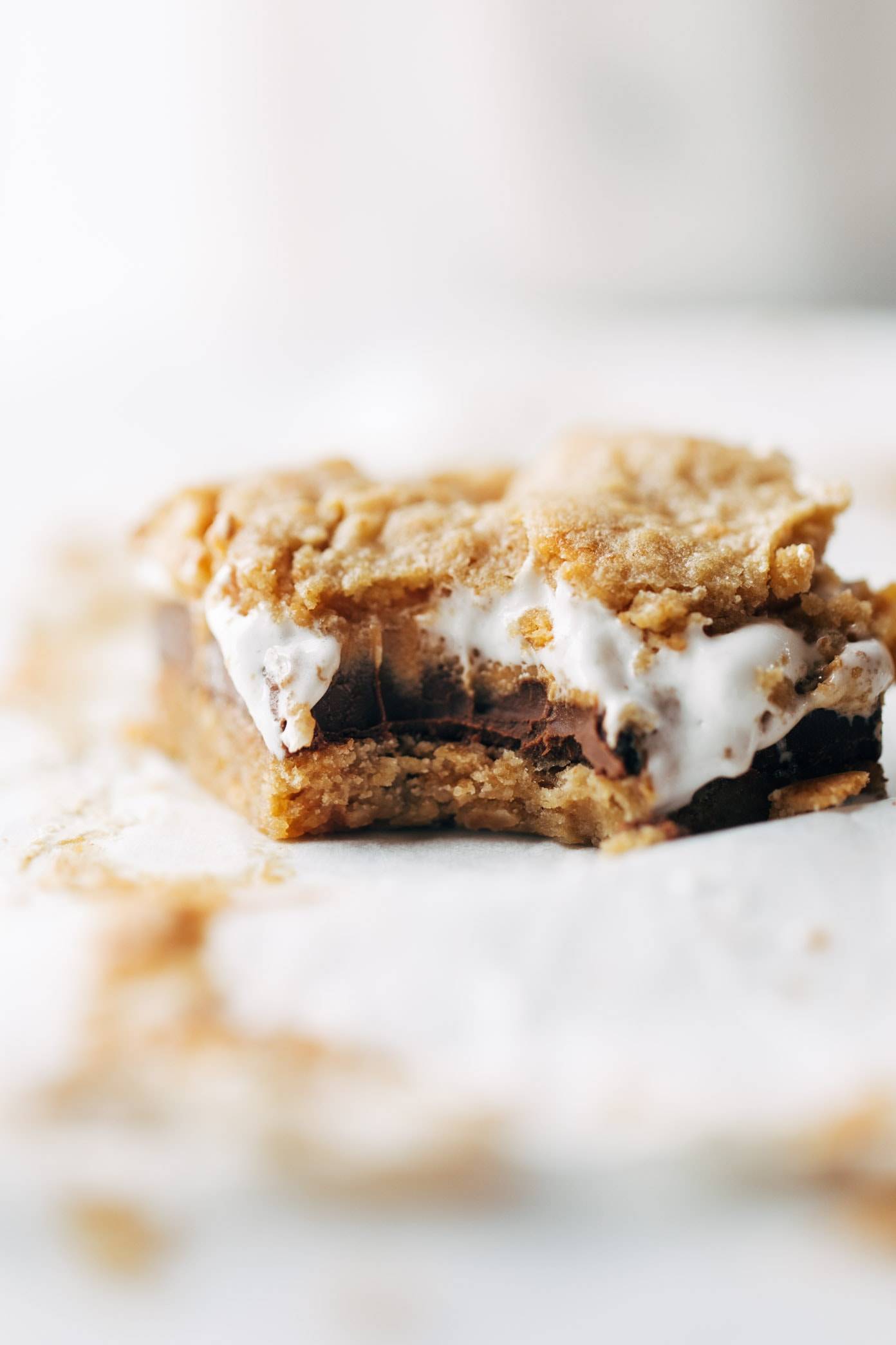 S'Mores Bars - chocolate, marshmallow, and peanut butter sandwiched between two layers of soft graham cookie crust. these are SO, SO GOOD. | pinchofyum.com