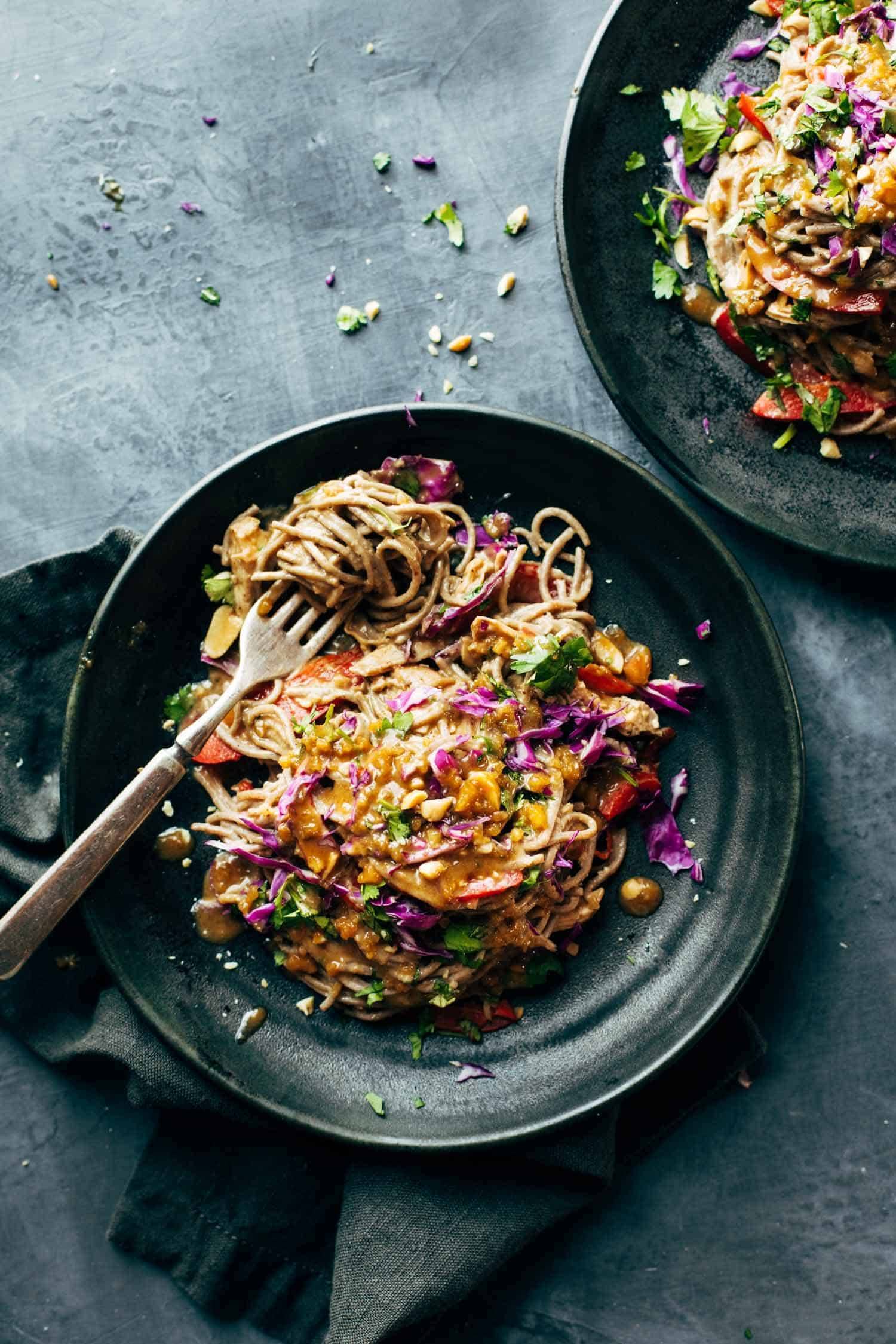 Spicy Peanut Soba Noodle Salad - red peppers, cabbage, chicken, soba noodles, and a quick homemade spicy peanut sauce. salads don't get much yummier than this. gluten free. | pinchofyum.com