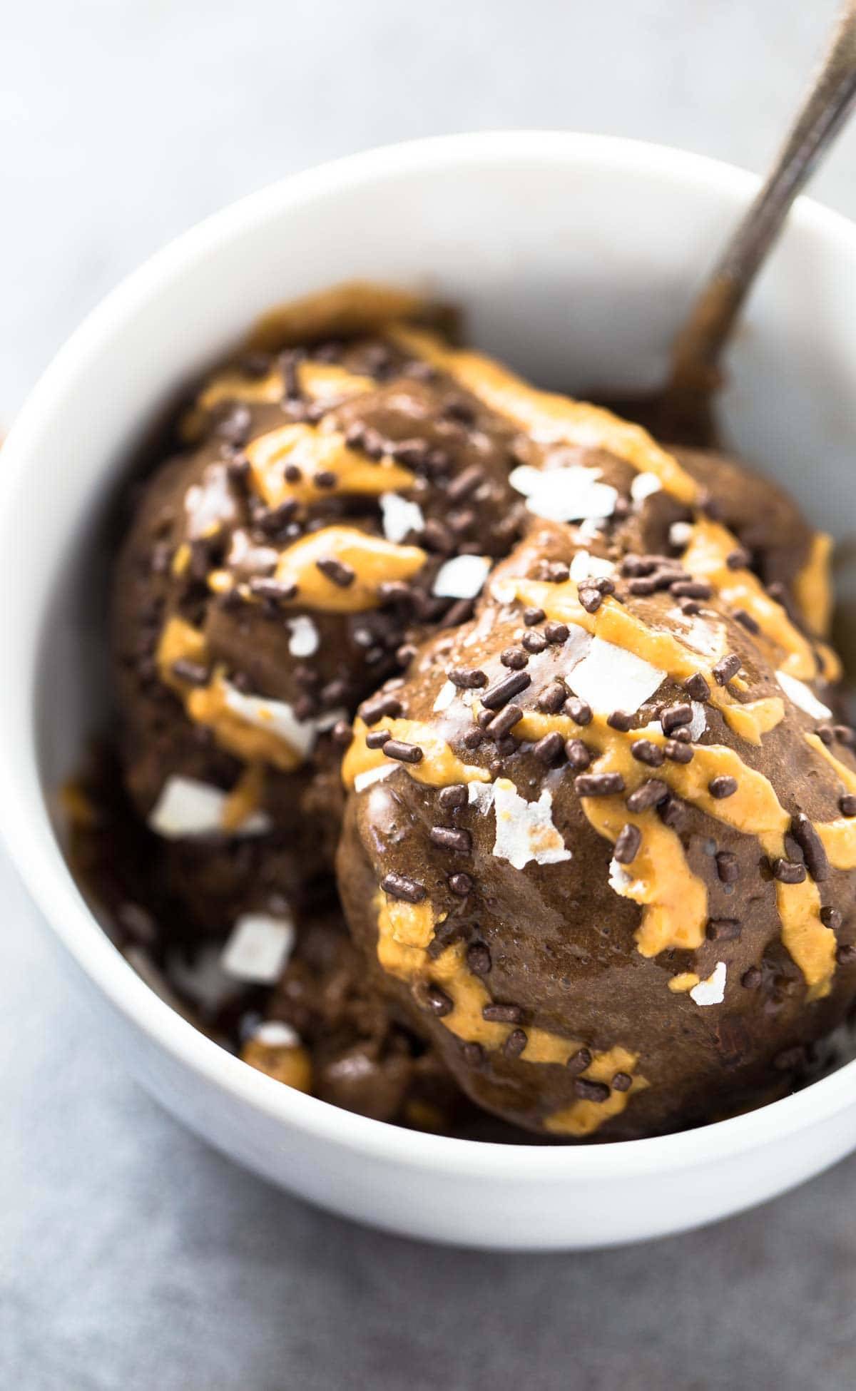 Naturally Sweet Ice Cream recipe - just three simple ingredients and no ice cream maker required! Refined sugar free, dairy free, loaded with chocolate banana and peanut butter flavor! | pinchofyum.com